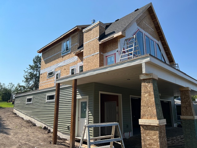 161 Custom Home with Siding